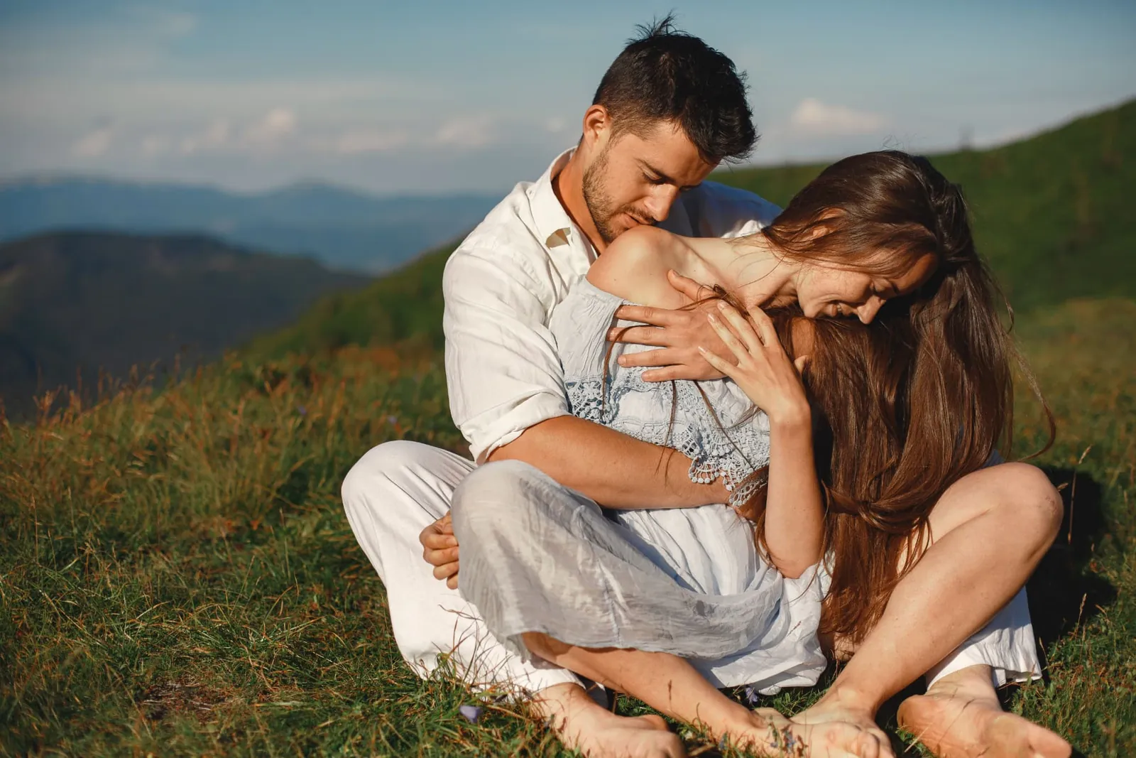 Couple embracing outdoors: emotional connection and intimacy as the basis of female desire